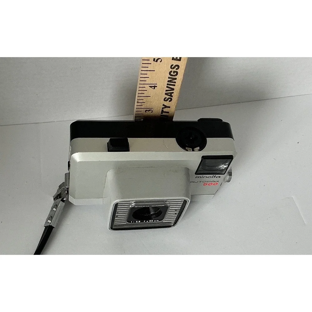 Minolta Vintage Autopak 500 Film Camera Rokkor 38mm f/2.8 Lens Silver Black Retr